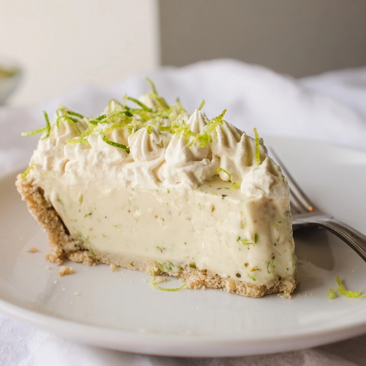 Baking a beautiful Keto Key Lime Pie, golden crust with a vibrant filling.