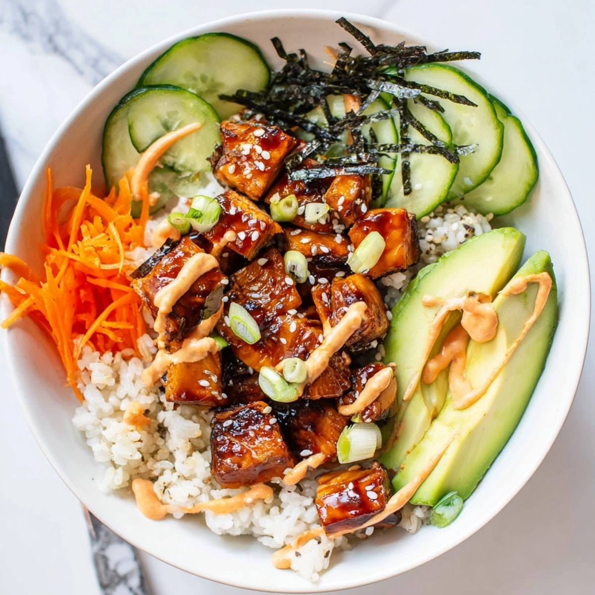 Close-up of a delicious Spicy Salmon Rice Bowl highlighting the glazed salmon and vibrant veggies.