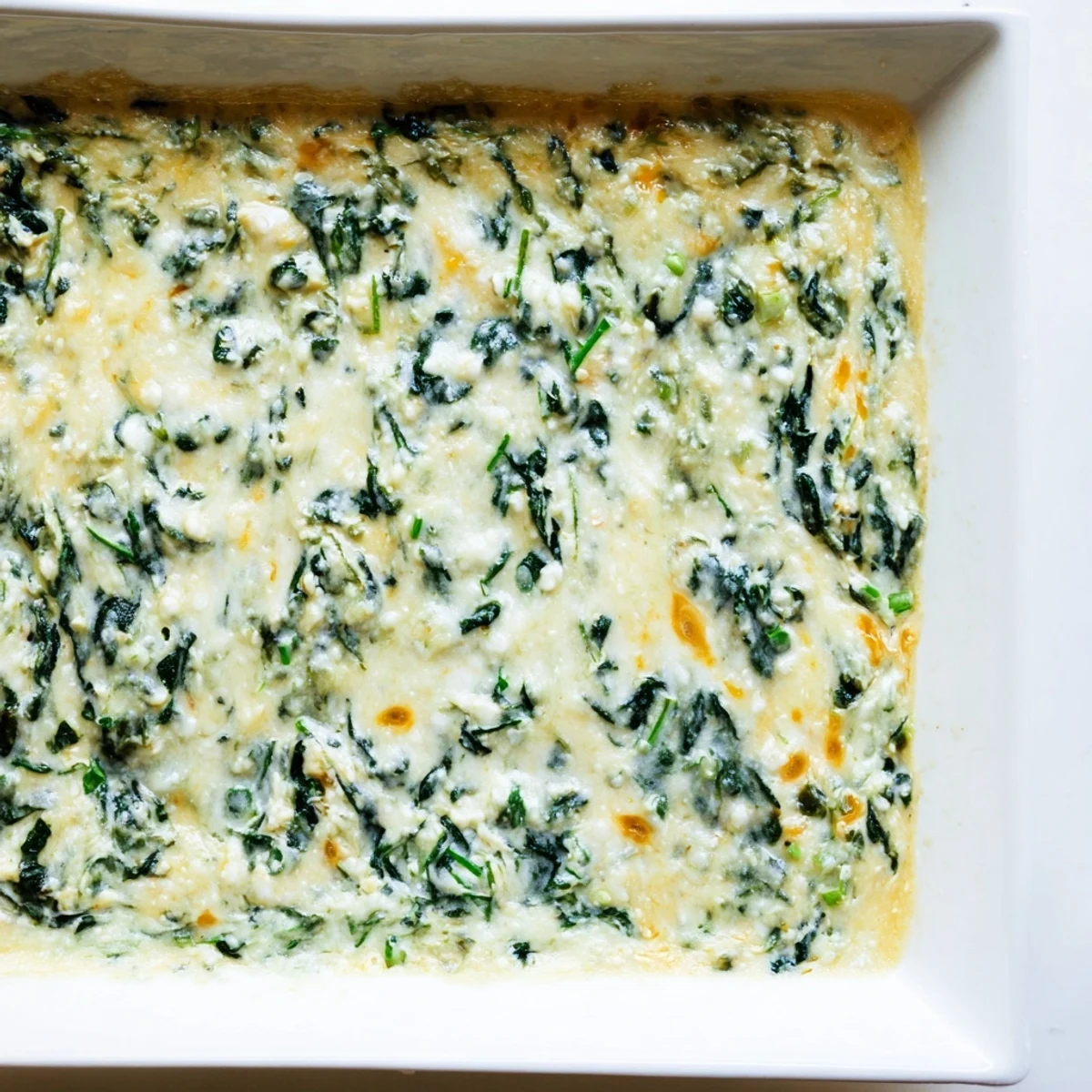 Warm and savory Creamy Spinach Dip, a delectable appetizer perfect for sharing with friends and family.