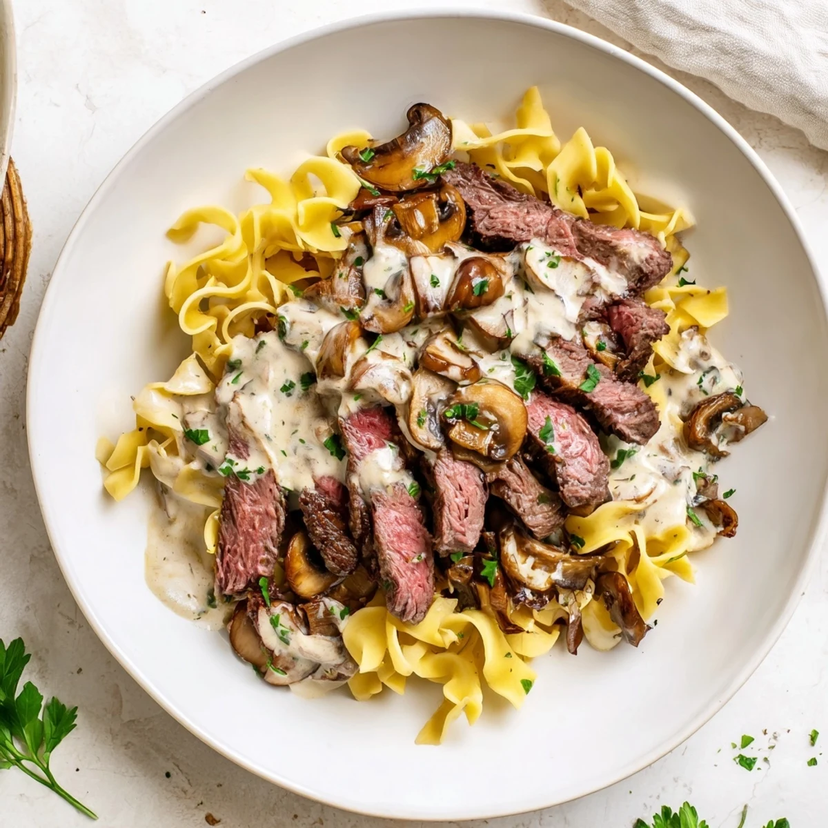 Tender beef and creamy mushrooms are showcased in this delicious Savory Beef Stroganoff recipe.