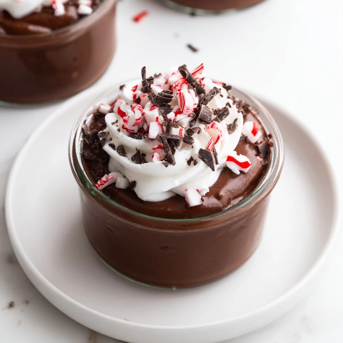 Silky smooth chocolate peppermint mousse, perfectly paired as a delightful after-dinner dessert.