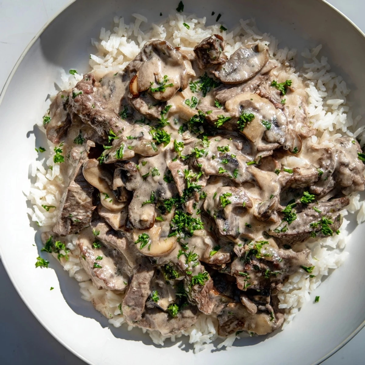 Creamy beef stroganoff, a classic comfort food, with hearty beef and mushrooms, perfect for dinner.