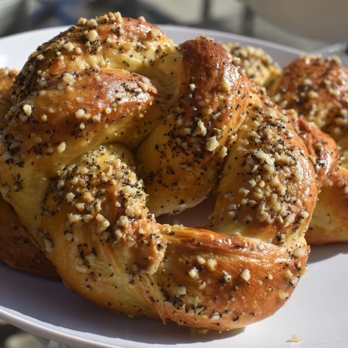 Twisted Knot Garlic bread, pillowy soft with a garlic-herb aroma, perfect for dipping.