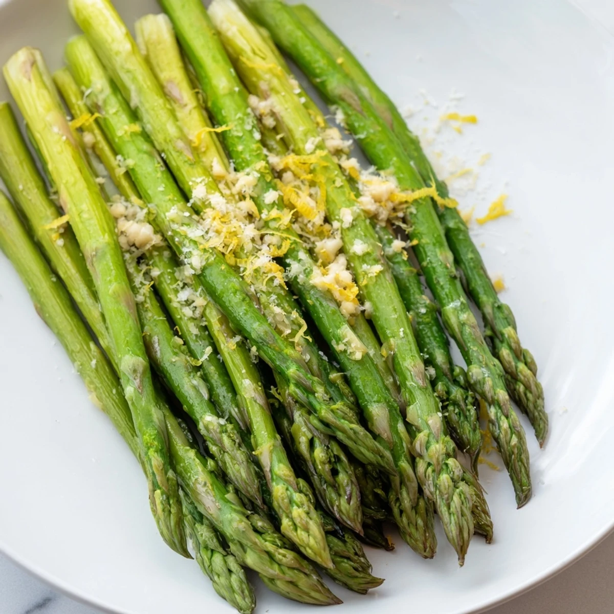Golden-brown Lemon Garlic Asparagus with Parmesan, a flavorful and easy Mediterranean side dish.