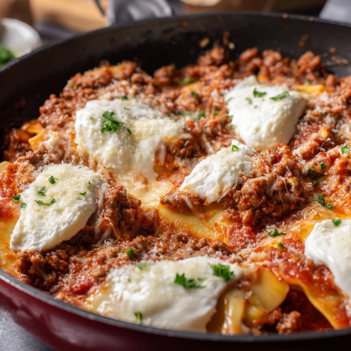 Imagine a comforting Cheats Frypan Lasagne with hearty beef sauce and ricotta, its aroma filling your kitchen on a cozy weeknight.