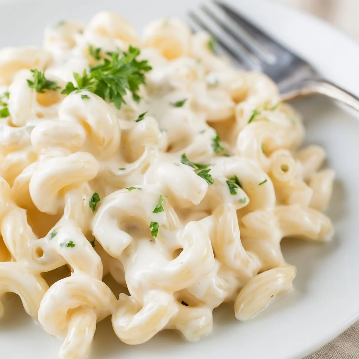Bubbling hot Boursin mac and cheese casserole with melted cheese sauce and crispy panko topping