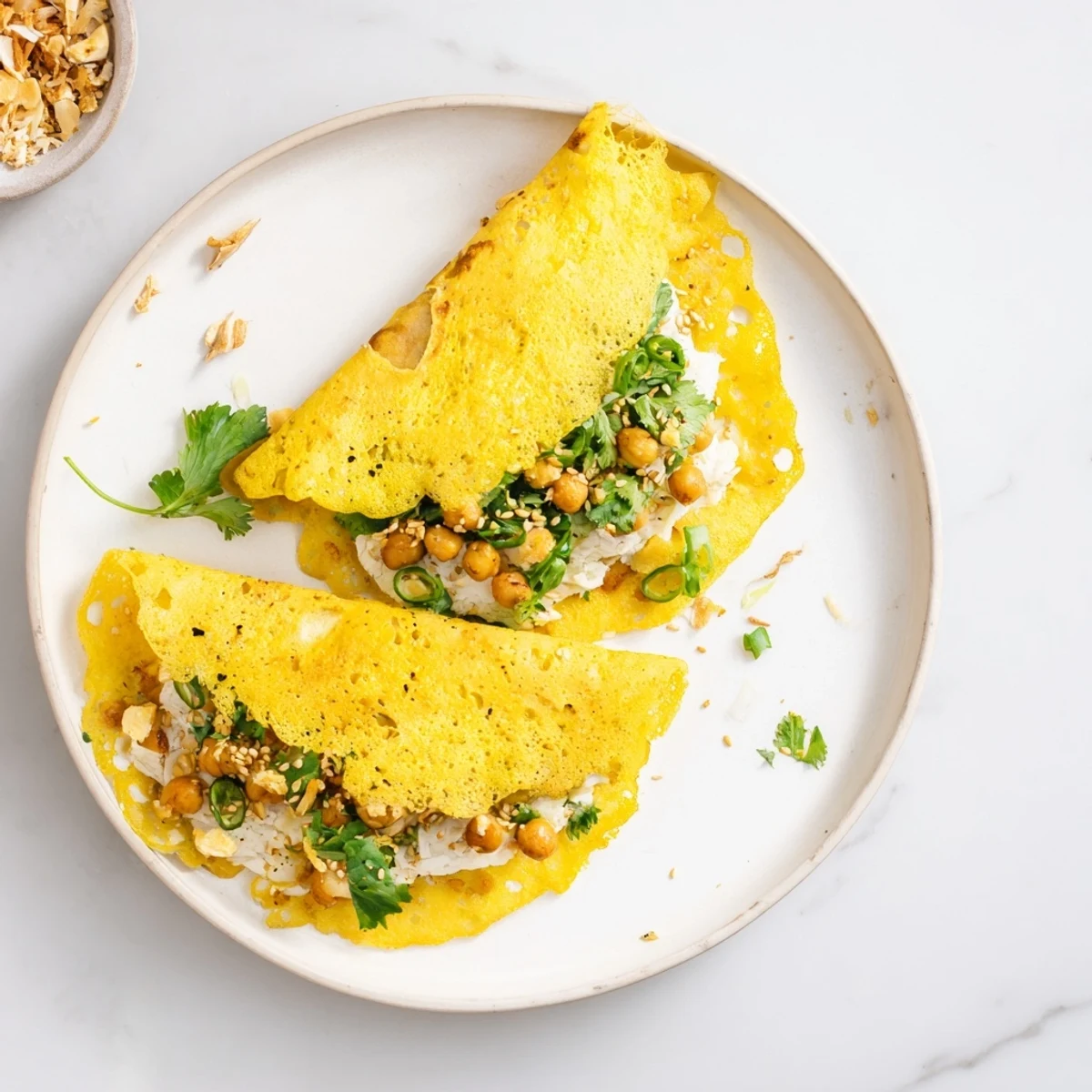 Golden Mont Lin Ma Yar pancakes filled with quail eggs and fresh green herbs