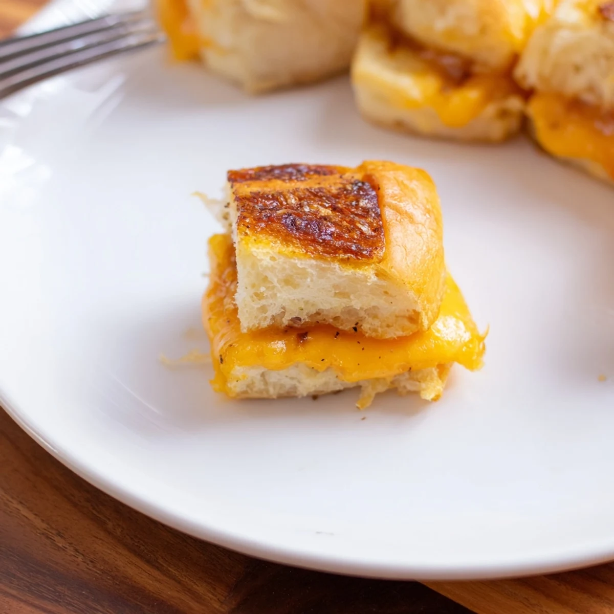 Party-ready Mini Grilled Cheese Hawaiian Rolls: sweet rolls, gooey cheddar, perfect handheld snacks